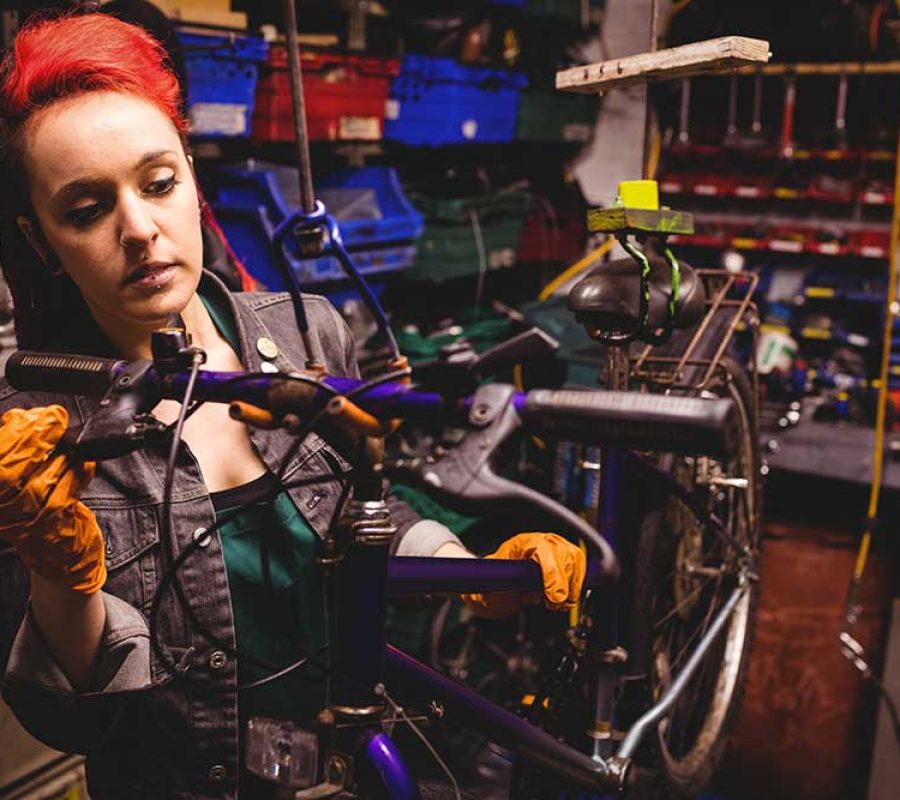 mechanic-repairing-bicycle